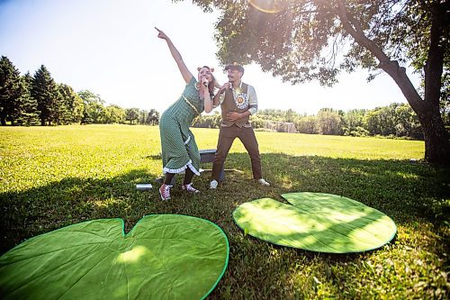 MIKAELA MACKENZIE / FREE PRESS

	
Mario (left) and Brittany Lagass present a part of their piece, Responsibilitarian, as part of Bike and Circuses at Whittier Park on Thursday, Aug. 1, 2024. 

For Thandi story.