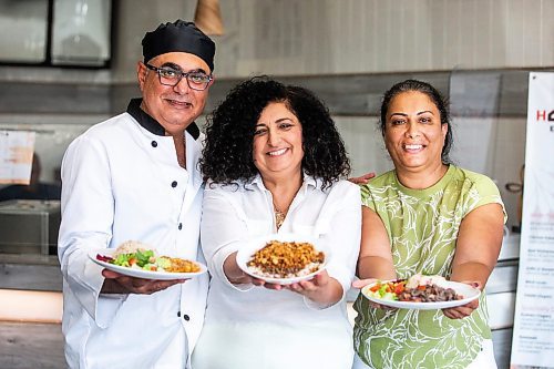 MIKAELA MACKENZIE / FREE PRESS

	
Chef George Abraham (left) and pavilion co-ordinators Hala Salama (centre) and Omneya Khalifa with Egyptian dishes at House of Taste on Wednesday, July 31, 2024. 

For Eva story.