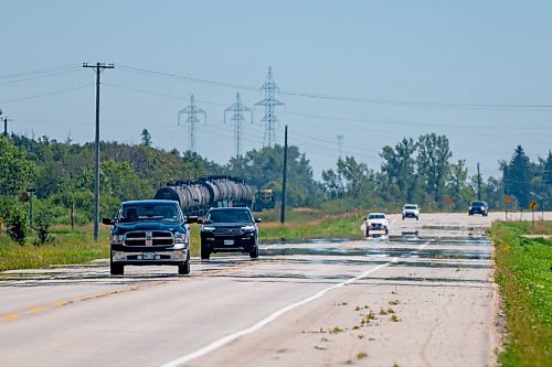 NIC ADAM / FREE PRESS
The heat reflecting off highway 6, between Warren and Grosse Isle, Thursday. The temperature was 32C and is forecasted to be 30C tomorrow.
240801 - Thursday, August 01, 2024.

Reporter:?
