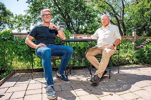 NIC ADAM / FREE PRESS
Scott MacKay (right), founder and former CEO of Probe Research, and Peter George, former CEO of McKim Communications Group, pictured in MacKay&#x2019;s backyard Thursday morning.
240801 - Thursday, August 01, 2024.

Reporter: Martin