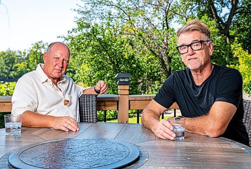 NIC ADAM / FREE PRESS
Scott MacKay (left), founder and former CEO of Probe Research, and Peter George, former CEO of McKim Communications Group, pictured in MacKay&#x2019;s backyard Thursday morning.
240801 - Thursday, August 01, 2024.

Reporter: Martin