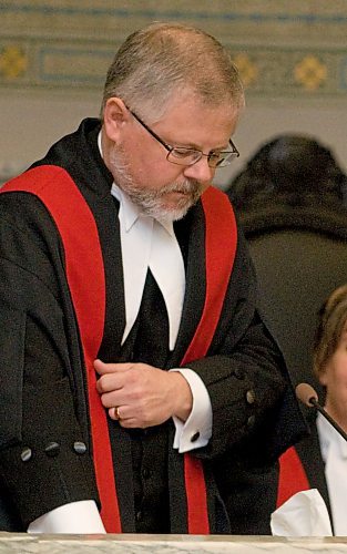 DAVID LIPNOWSKI / WINNIPEG FREE PRESS (October 23, 2009) Judge Robert Heinrichs and Judge Sandra Chapman were sworn into the Provincial Court of Manitoba Friday afternoon in Winnipeg.   For Brandon Sun