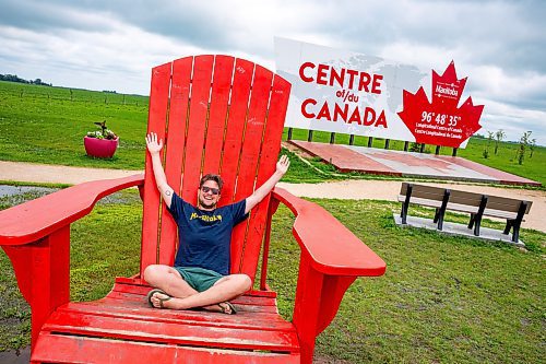 NIC ADAM / FREE PRESS
Steven Conte from Melbourne Australia pictured at the longitudinal centre of Canada, just off hwy 1 Tuesday.
240723 - Tuesday, July 23, 2024.

Reporter: Jura