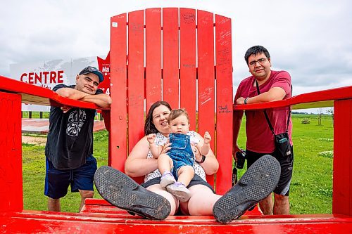 NIC ADAM / FREE PRESS
Travis, Alanna, Clara, and Murray Bechard (from left) from Sudbury Ontario pictured at the longitudinal centre of Canada, just off hwy 1 Tuesday.
240723 - Tuesday, July 23, 2024.

Reporter: Jura