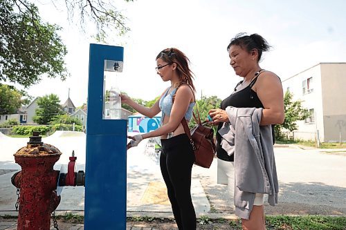 Ruth Bonneville / Free Press

Local - Hydration Stations

Madison and her mom Priscilla stop to fill up a water bottle with water at the hydration station located at 185 Young Street.  

The City of Winnipeg has hydration stations throughout the city to cool off and access clean drinking water.  

July 12th,  2024

