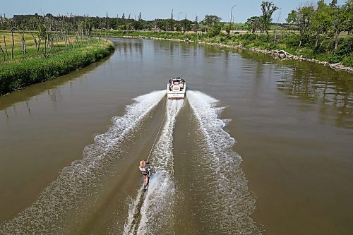 Jen Jones with the Brandon Waterski Club slalom skis on the Assiniboine River in Brandon on a hot Friday afternoon. (Tim Smith/The Brandon Sun)