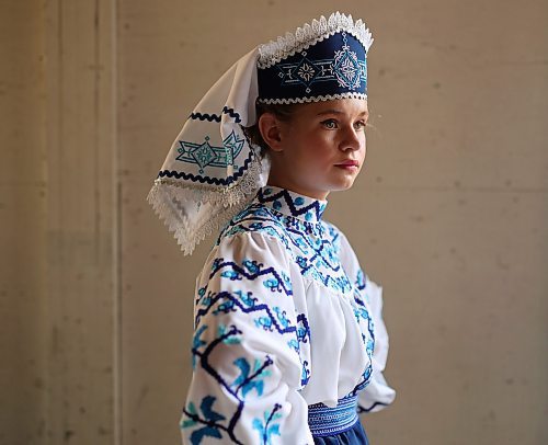 Emerson Schmidt with the Nipawin Veselii Dancers waits backstage to perform in the Polissia solo female 10-12 years old category of the talent competition on Friday. (Tim Smith/The Brandon Sun)