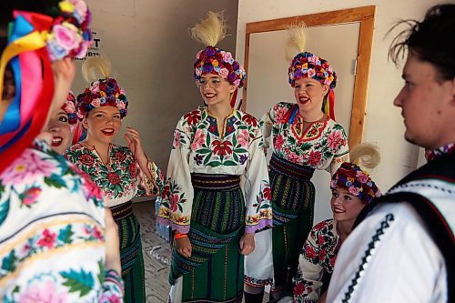 Dancers with the Yalenka Ukrainian Dancers Society laugh backstage before performing in the Bukovna large group mixed 16-plus years category in the talent competition. (Tim Smith/The Brandon Sun)