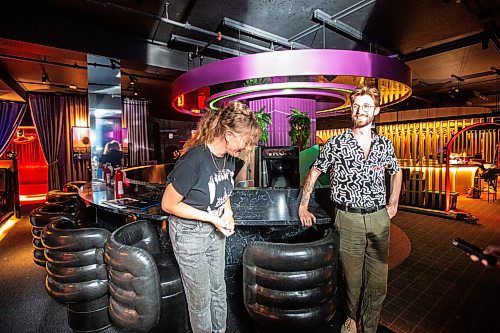 MIKAELA MACKENZIE / FREE PRESS

Jaclyn Wiebe and Tyler Davies at the in-progress Barcade space in the East Exchange on Wednesday, July 24, 2024. 

For Eva story.