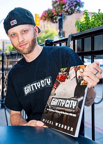 NIC ADAM / FREE PRESS
Nigel Webber, pictured at his book launch at the Handsome Daughter Thursday, interviewed over 120 important figures in Winnipeg hip-hop history for Gritty City, an oral history of the genre in the city that spans 1980 through 2005. 
240801 - Thursday, August 01, 2024.

Reporter: Ben Waldman