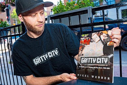 NIC ADAM / FREE PRESS
Nigel Webber, pictured at his book launch at the Handsome Daughter Thursday, interviewed over 120 important figures in Winnipeg hip-hop history for Gritty City, an oral history of the genre in the city that spans 1980 through 2005. 
240801 - Thursday, August 01, 2024.

Reporter: Ben Waldman