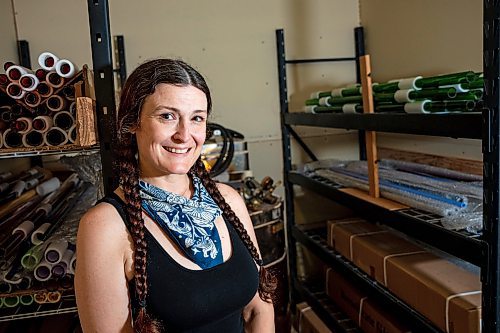 NIC ADAM / FREE PRESS
Glass worker Brook Drabot pictured in the garage studio of her Warren home Friday. Brook loves making very small things, blowing glass to create tiny vases, miniature ornaments and small bowls. 
240801 - Thursday, August 01, 2024.

Reporter: