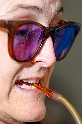 NIC ADAM / FREE PRESS
Glass worker Brook Drabot pictured blowing glass in the garage studio of her Warren home Friday. Brook loves making very small things, blowing glass to create tiny vases, miniature ornaments and small bowls. 
240801 - Thursday, August 01, 2024.

Reporter: