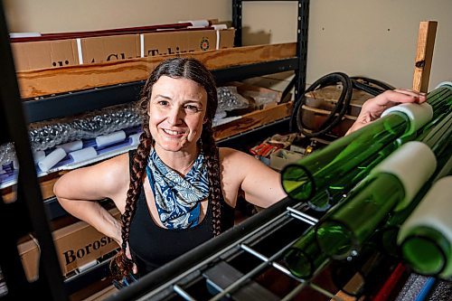 NIC ADAM / FREE PRESS
Glass worker Brook Drabot pictured in the garage studio of her Warren home Friday. Brook loves making very small things, blowing glass to create tiny vases, miniature ornaments and small bowls. 
240801 - Thursday, August 01, 2024.

Reporter: