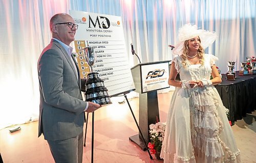 Ruth Bonneville / Free Press

Sports - MB Derby

Winnipeg Mayor Scott Gillingham has his photo taken with the Queens Trophy after a live draw took place at luncheon at the Assiniboine Downs and the names of the horses were posted by ASD Derby Belle, Francine Fournier for this years Manitoba Derby on Friday. 

The 76th running of the Manitoba Derby presented by Manitoba Liquor &amp; Lotteries takes place on Monday, August 5 at 7:30 p.m.


Aug 2nd,  2024

