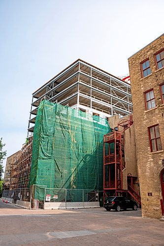 NIC ADAM / FREE PRESS
The outside of Concord Properties&#x2019; new 10-storey, $30 million, mixed used building, pictured on Friday, on the site of a former surface parking lot in the Exchange District. This is where Concord&#x2019;s new office will be once completed.
240802 - Friday, August 02, 2024.

Reporter: Martin Cash