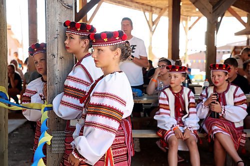 02082024
Young dancers watch fellow competitors perform during the Talent Competition on the opening day of Canada's National Ukrainian Festival at Selo Ukraina south of Dauphin on Friday. The three day event includes all manner of entertainment and celebration of Ukrainian culture.
(Tim Smith/The Brandon Sun)