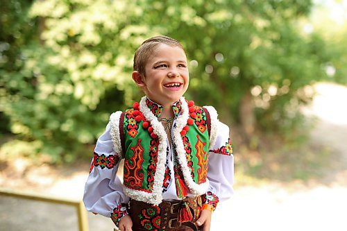 02082024
Eight-year-old Rider Gray with Yednist School of Ukrainian Dance laughs backstage before performing in the Hutzul Solo Male 7-9 yrs category in the Talent Competition during the opening day of Canada's National Ukrainian Festival at Selo Ukraina south of Dauphin on Friday. The three day event includes all manner of entertainment and celebration of Ukrainian culture.
(Tim Smith/The Brandon Sun)