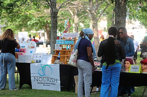 Market shoppers check out vendor offerings. The Naija Market is the first of its kind in Brandon and featured vendors from many different African countries. (Geena Mortfield/The Brandon Sun)