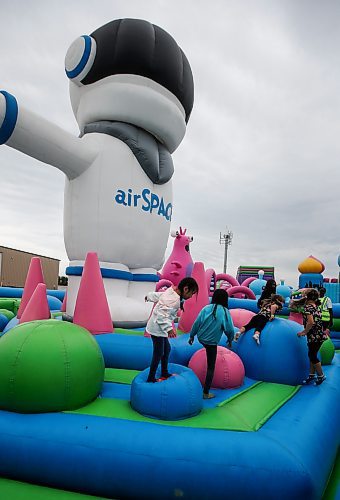 JOHN WOODS / FREE PRESS
People bounce on inflatable attractions at Big Bounce Canada, home of the largest bounce house, at Red River Exhibition Park Sunday, August 4, 2024. 

Reporter: ?