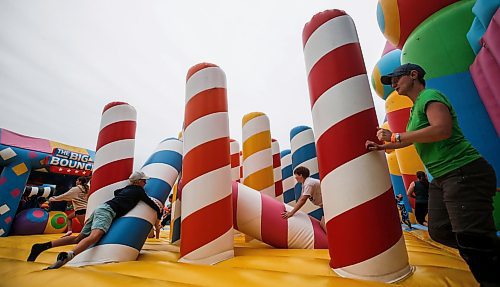 JOHN WOODS / FREE PRESS
People bounce on inflatable attractions at Big Bounce Canada, home of the largest bounce house, at Red River Exhibition Park Sunday, August 4, 2024. 

Reporter: ?