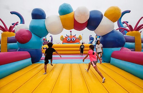 JOHN WOODS / FREE PRESS
People bounce on inflatable attractions at Big Bounce Canada, home of the largest bounce house, at Red River Exhibition Park Sunday, August 4, 2024. 

Reporter: ?