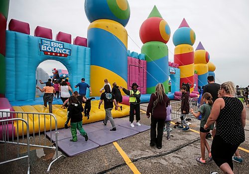 JOHN WOODS / FREE PRESS
People bounce on inflatable attractions at Big Bounce Canada, home of the largest bounce house, at Red River Exhibition Park Sunday, August 4, 2024. 

Reporter: ?