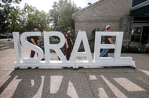 JOHN WOODS / FREE PRESS
Police attend the Israel pavilion at Folklorama at the Asper Jewish Community Campus  Monday, August 5, 2024. 

Reporter: tyler