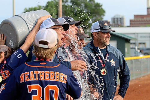 Prince Albert Astros players surprise their coaches with some cold water after they beat the Cross Lake Red 
Sox to win the under-13 boys western Canadian championship at the Ashley Neufeld Softball Complex on Sunday. (Perry Bergson/the Brandon Sun)
Aug. 6, 2024