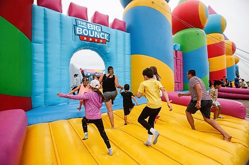 JOHN WOODS / FREE PRESS
People bounce on inflatable attractions at Big Bounce Canada, home of the largest bounce house, at Red River Exhibition Park Sunday, August 4, 2024. 

Reporter: ?