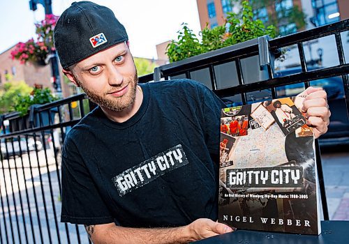 NIC ADAM / FREE PRESS
Nigel Webber, pictured at his book launch at the Handsome Daughter Thursday, interviewed over 120 important figures in Winnipeg hip-hop history for Gritty City, an oral history of the genre in the city that spans 1980 through 2005. 
240801 - Thursday, August 01, 2024.

Reporter: Ben Waldman