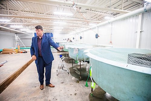 MIKAELA MACKENZIE / FREE PRESS

	
Sapphire Springs COO Doug Hotson shows the ponding tanks with one month old fry, which will be future broodstock, in their temporary facility as the new arctic char fish farm is constructed in the RM of Rockwood on Tuesday, Aug. 6, 2024. 

For Martin Cash story.