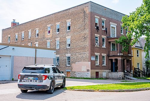 NIC ADAM / FREE PRESS
Police attend the scene of an incident involving two Manitoba Hydro workers, accompanied by a security guard, after they were attacked by residents of 583 Furby St. while working inside the building Tuesday morning.
240806 - Tuesday, August 06, 2024.

Reporter: Tyler