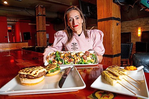 NIC ADAM / FREE PRESS
Brazilian cheese maker Fabiola Della Pria pictured alongside dishes using her Minas Frescal and BBGrill cheeses at Hermano&#x2019;s restaurant in the Exchange District Tuesday.
240806 - Tuesday, August 06, 2024.

Reporter: Dave