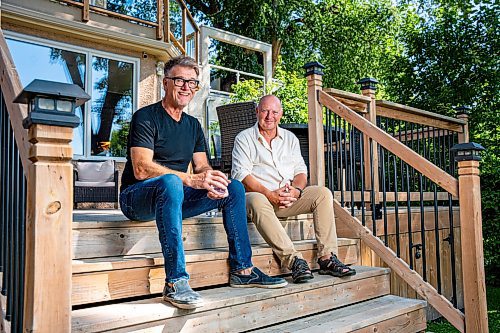 NIC ADAM / FREE PRESS
Scott MacKay (right), founder and former CEO of Probe Research, and Peter George, former CEO of McKim Communications Group, pictured in MacKay&#x2019;s backyard Thursday morning.
240801 - Thursday, August 01, 2024.

Reporter: Martin