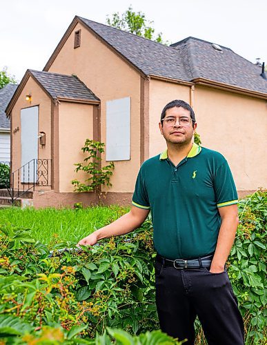 NIC ADAM / FREE PRESS
Ed Artola, pictured outside his property Wednesday, is a Winnipeg landlord who blames a vacant house next door for preventing him from being able to sell a home he owns and rents out on Atlantic Avenue. After putting his property on the market for over a year, Artola said his realtor told him the vacant home, which attracts squatters and poses a fire risk, was the issue deterring buyers. 
240807 - Wednesday, August 07, 2024.

Reporter: Joyanne