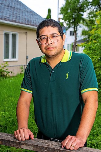 NIC ADAM / FREE PRESS
Ed Artola, pictured outside the vacant property Wednesday, is a Winnipeg landlord who blames a vacant house next door for preventing him from being able to sell a home he owns and rents out on Atlantic Avenue. After putting his property on the market for over a year, Artola said his realtor told him the vacant home, which attracts squatters and poses a fire risk, was the issue deterring buyers. 
240807 - Wednesday, August 07, 2024.

Reporter: Joyanne