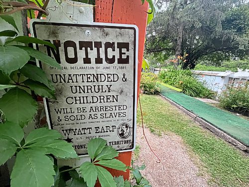 The light-hearted sign outside the entrance to the mini golf area at CJ's Snack Shack and Mini Golf at Rivers Provincial Park. (Matt Goerzen/The Brandon Sun)