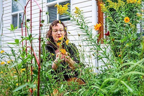 NIC ADAM / FREE PRESS
Local artist Ash Alberg, pictured outside her home Thursday, has created a new curriculum for arts teachers across the province and the public on natural dyes and projects in classrooms. 
240808 - Thursday, August 08, 2024.

Reporter: Maggie