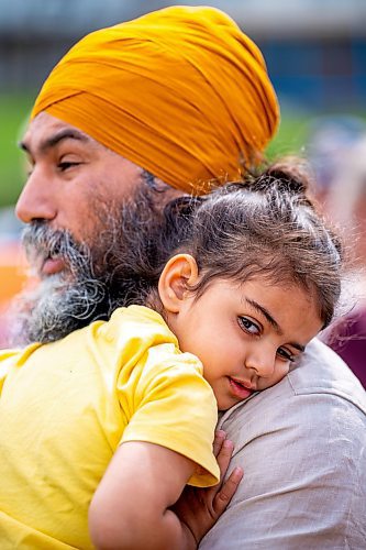 NIC ADAM / FREE PRESS
NDP Leader Jagmeet Singh and his youngest at White Spruce Park before setting up campaign signs in for the upcoming Elmwood-Transcona byelection.
240809 - Friday, August 09, 2024.

Reporter: Aaron