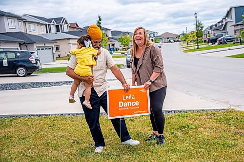 NIC ADAM / FREE PRESS
NDP Leader Jagmeet Singh, his youngest daughter, and NDP candidate Leila Dance (from left), set up campaign signs in Peguis Friday for the upcoming Elmwood-Transcona byelection.
240809 - Friday, August 09, 2024.

Reporter: Aaron