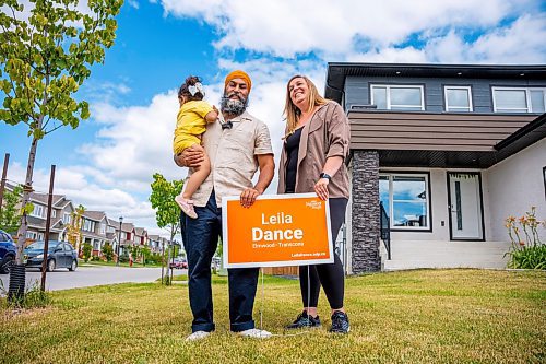 NIC ADAM / FREE PRESS
NDP Leader Jagmeet Singh, his youngest daughter, and NDP candidate Leila Dance (from left), set up campaign signs in Peguis Friday for the upcoming Elmwood-Transcona byelection.
240809 - Friday, August 09, 2024.

Reporter: Aaron