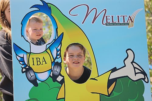 Left: Blakely Lewis/McGuigan and Ryker Brown pose for picture during the Banana Days festival on Saturday afternoon at the Banana Belt statue site. Photos: Abiola Odutola/The Brandon Sun