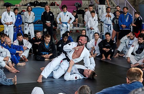 JOHN WOODS / FREE PRESS
Matt MacDonald of Balance Jiu Jitsu, gives a demonstration with his son Logan during the Strangle In The Park at the Forks Sunday, August 11, 2024. Strangle In The Park is an outdoor community open mat and seminar event. About 130 jiu jitsu members from 22 academies from southern Manitoba came together for a day of grappling and training. The event raised $110 for a dream child at  Dream Factory.

Reporter: ?