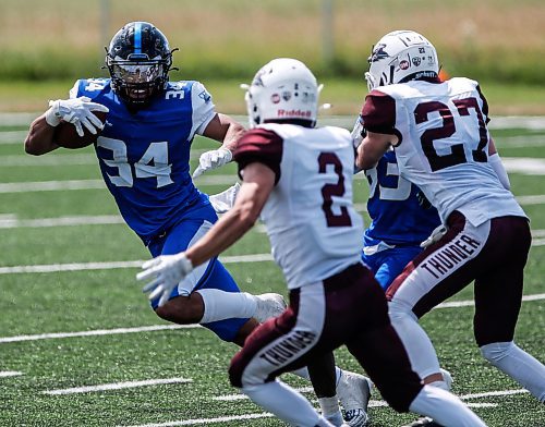 JOHN WOODS / FREE PRESS
Winnipeg Rifles&#x2019; Kaiden Banfield (34) runs for yards against the Regina Thunder during first half CJFL action in Winnipeg Sunday, August 11, 2024. 

Reporter: josh