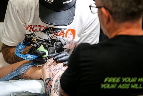 JOHN WOODS / FREE PRESS
A artist works during the Winnipeg Tattoo Convention at Red River Exhibition Park Sunday, August 11, 2024. More than 250 tattoo artists from around the globe came together to practice their craft.

Reporter: ?