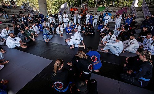 JOHN WOODS / FREE PRESS
Matt MacDonald of Balance Jiu Jitsu, gives a demonstration with his son Logan during the Strangle In The Park at the Forks Sunday, August 11, 2024. Strangle In The Park is an outdoor community open mat and seminar event. About 130 jiu jitsu members from 22 academies from southern Manitoba came together for a day of grappling and training. The event raised $110 for a dream child at  Dream Factory.

Reporter: ?