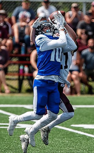 JOHN WOODS / FREE PRESS
Regina Thunder&#x2019;s Noah Zimroz (21) knocks down a pass intended for Winnipeg Rifles&#x2019; Aidan Avanthay (10) during first half CJFL action in Winnipeg Sunday, August 11, 2024. 

Reporter: josh