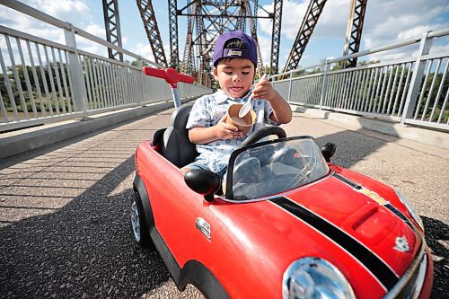 Ruth Bonneville / Free Press

Standup - Enjoying ice cream on a hot day in August in a little mini convertible Cooper (push) car.

Two-year-old Marcelo Gomez enjoys a cone in a dish of cool ice cream from Bridge Drive Inn with his parents and family on Monday. 

At one point he shared some with his dad, Robert,  but quickly went back to eating it himself while hanging out in his mini convertible Cooper push car. 


Aug 9th, 2024
