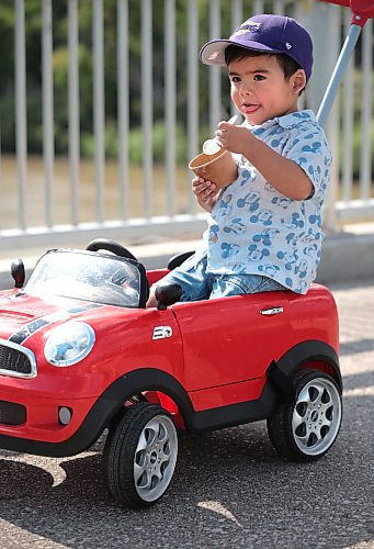 Ruth Bonneville / Free Press

Standup - Enjoying ice cream on a hot day in August in a little mini convertible Cooper (push) car.

Two-year-old Marcelo Gomez enjoys a cone in a dish of cool ice cream from Bridge Drive Inn with his parents and family on Monday. 

At one point he shared some with his dad, Robert,  but quickly went back to eating it himself while hanging out in his mini convertible Cooper push car. 


Aug 9th, 2024
